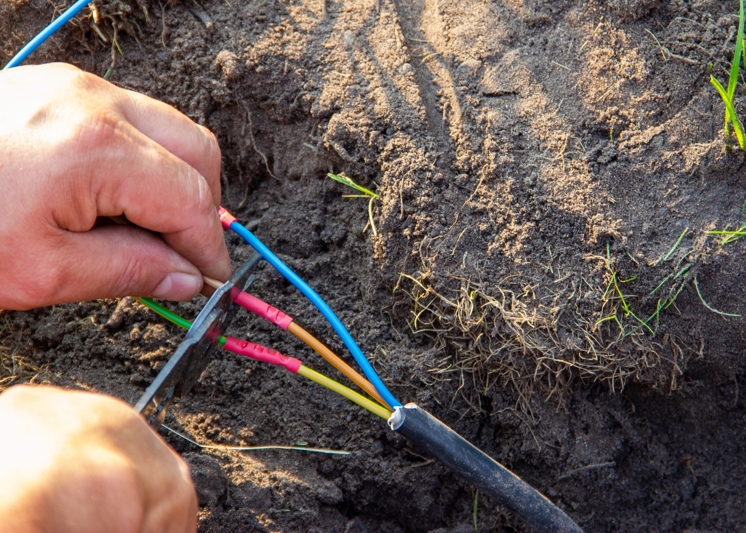 Laying power cables for a garden building